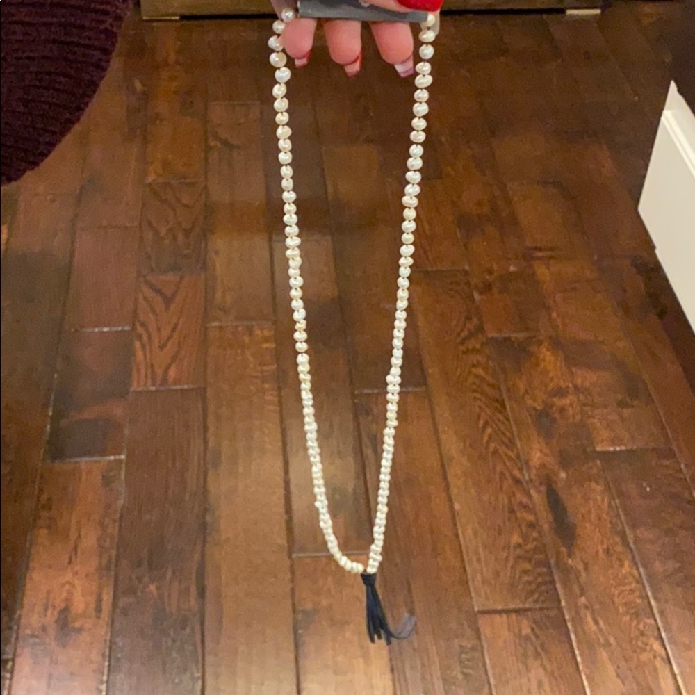 Long natural stone necklace with leather tassel